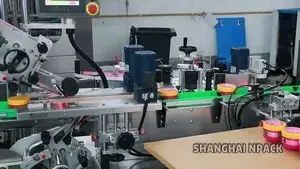 Etichettatrice automatica per l'applicazione superiore