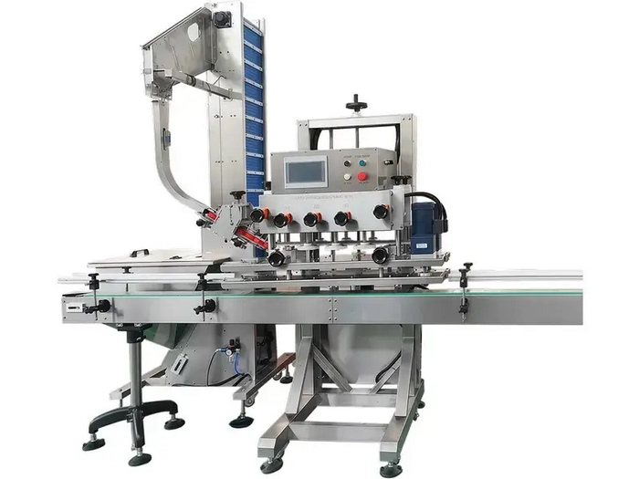 Tappatrice automatica con mandrino