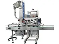 Tappatrice automatica con mandrino