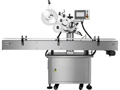 Etichettatrice automatica per l'applicazione superiore